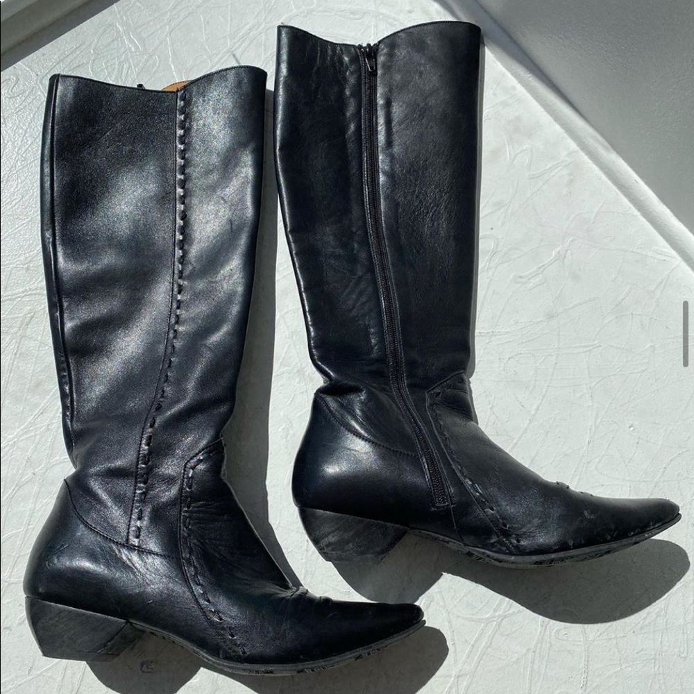 Black leather cowgirl boots. John Fluevog